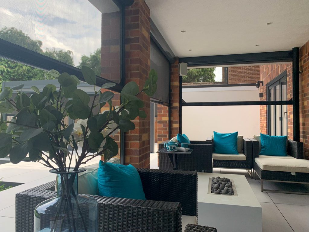Outdoor insect screens keeping seating dry